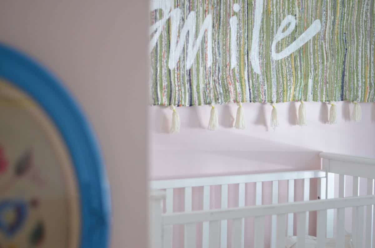 Boho bright and cheerful nursery with thrift market and boho details.