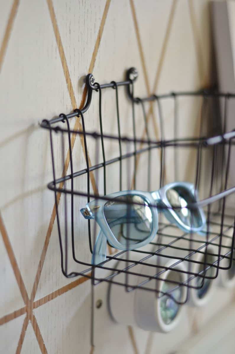 Organize your family with this creative use of one small kitchen wall.