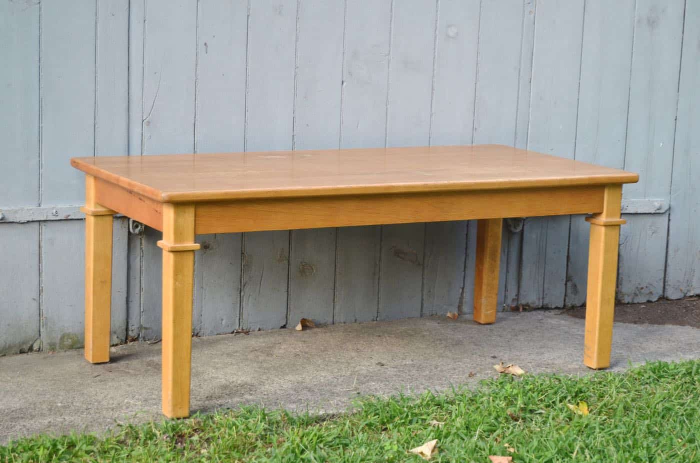 Coffee table turned woven nylon bench.