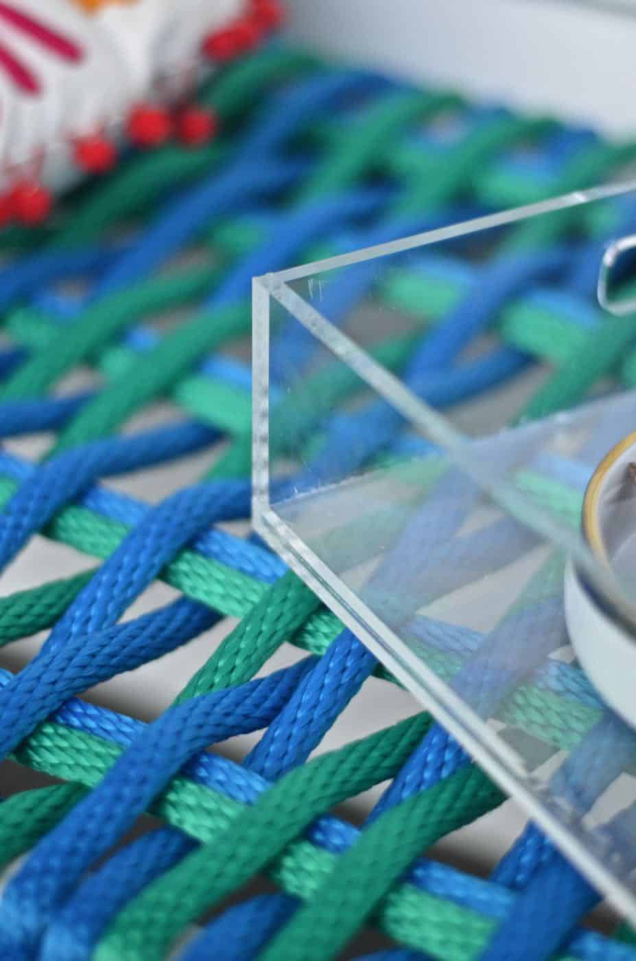 Coffee table turned woven nylon bench.