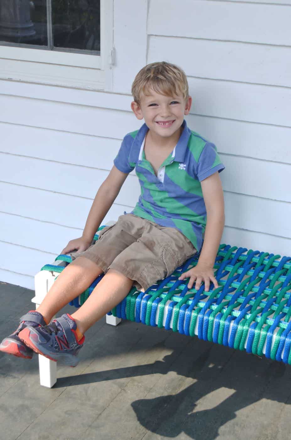 Coffee table turned woven nylon bench.