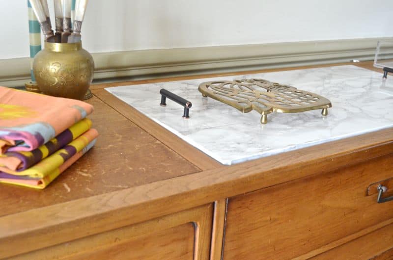 Adding a marble topper to this salvaged wooden buffet.