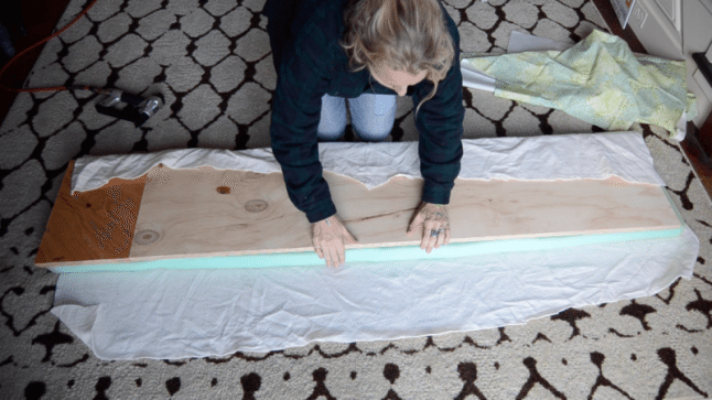 Turn this standard ikea shelf into a comfortable upholstered bench seat.