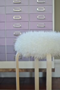 sheepskin on fur stool