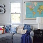 vintage map and sectional in family room