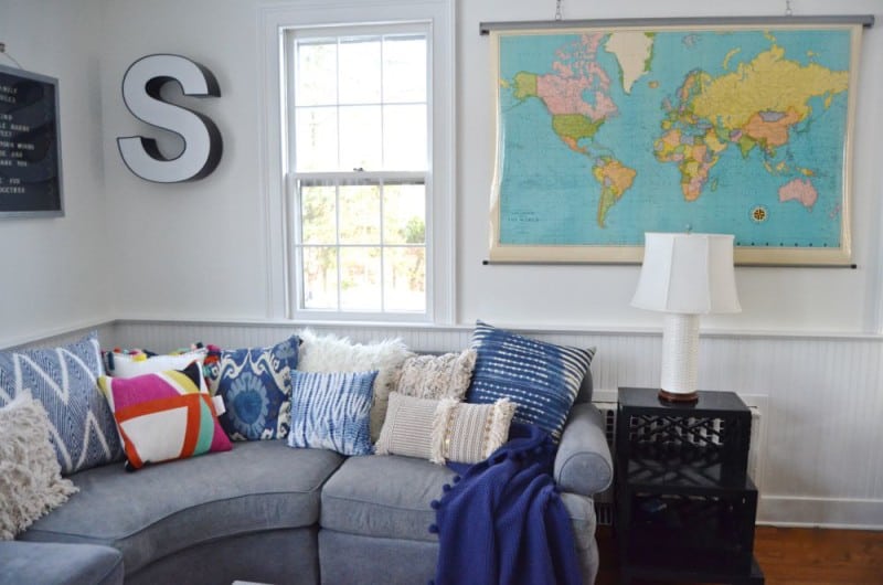 vintage map and sectional in family room