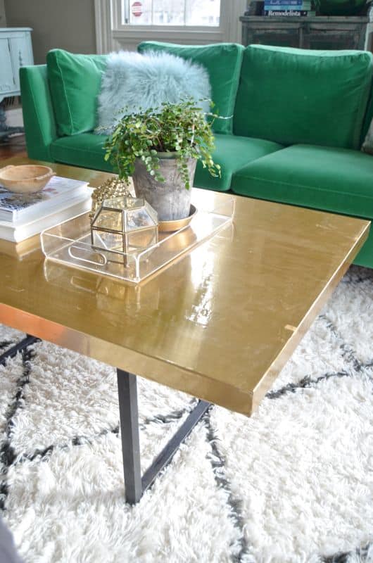 brass contact paper on table