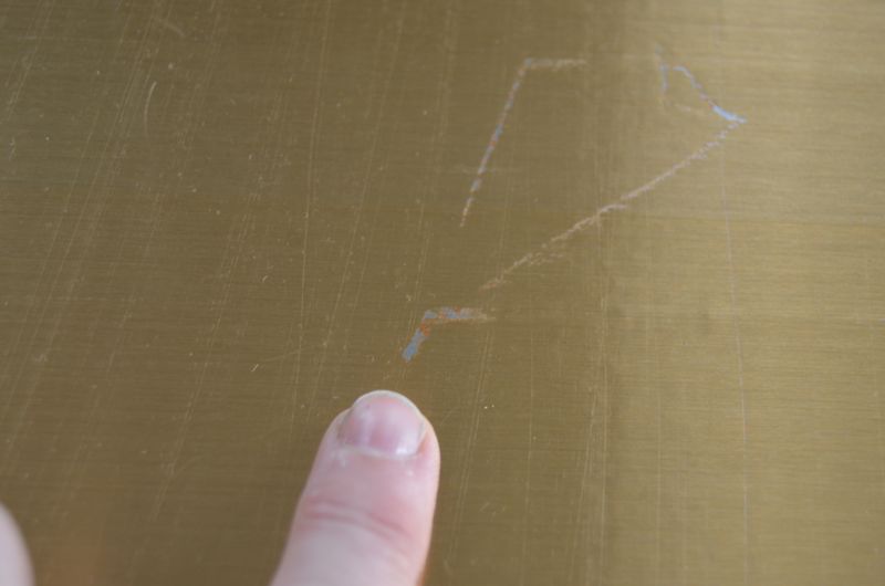 detail of brass scratch