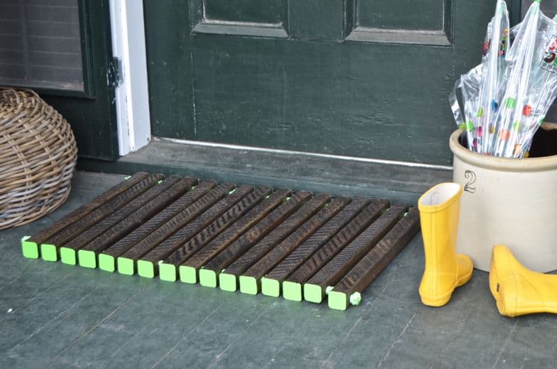 wooden doormat with etched detail