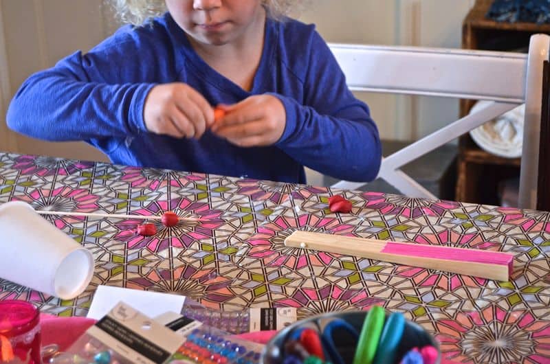 Fun arts and crafts birthday party with colorful decorations.