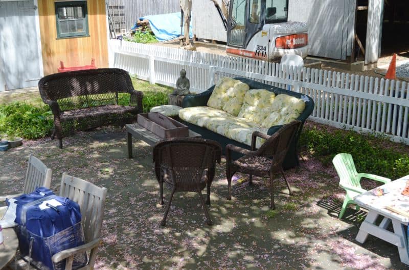 How to decorate a patio with mixed and matched eclectic furniture.