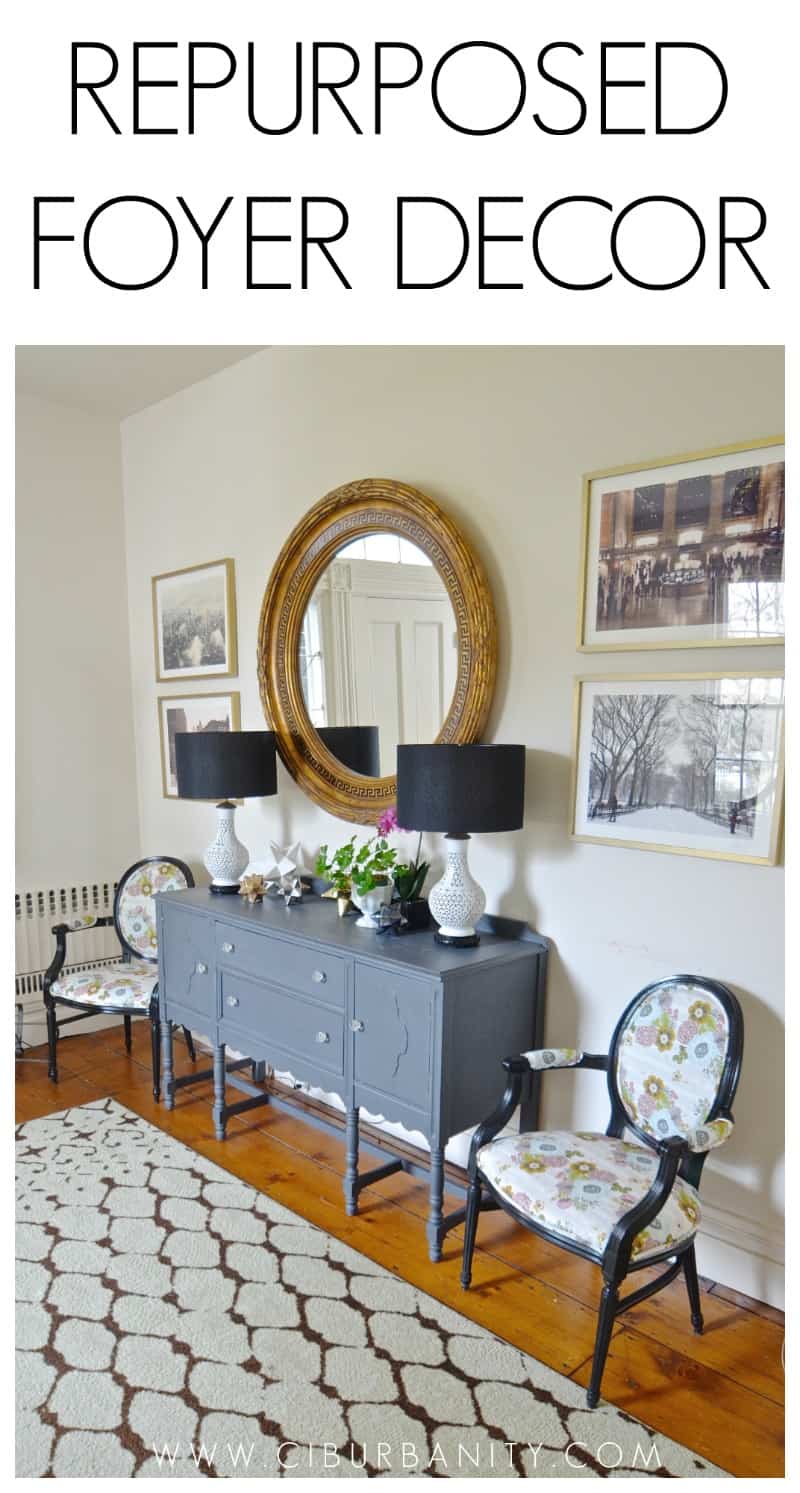 Eclectic foyer pulled together with refurbished furniture and fun fabric and accessories.