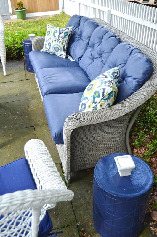 How to decorate a patio with mixed and matched eclectic furniture.