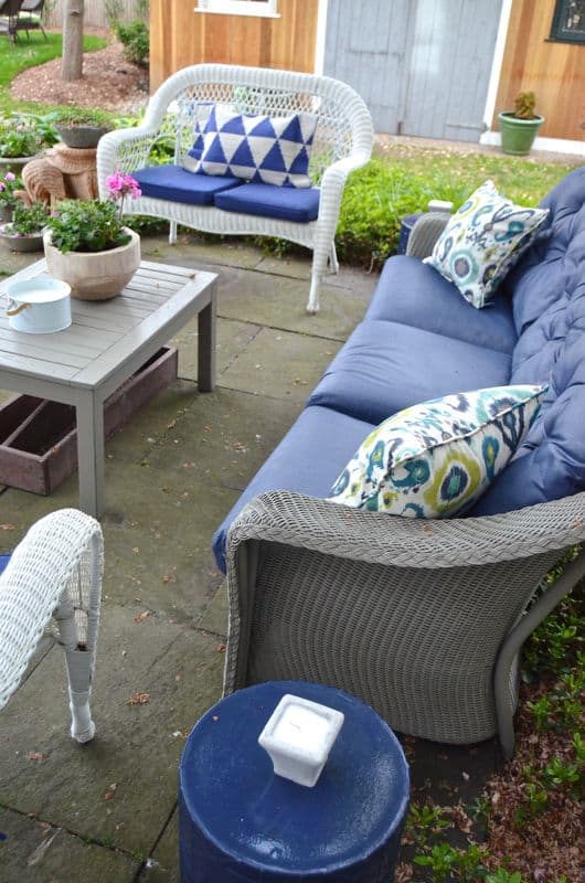 How to decorate a patio with mixed and matched eclectic furniture.