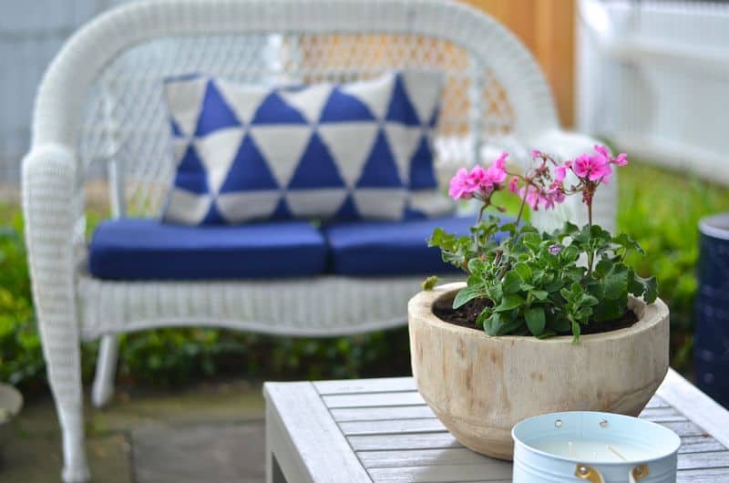 How to decorate a patio with mixed and matched eclectic furniture.