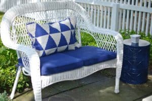 How to decorate a patio with mixed and matched eclectic furniture.
