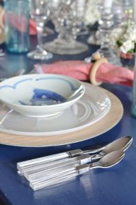 lucite silverware with navy table