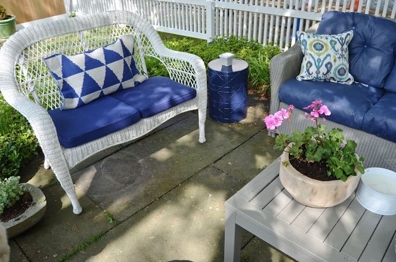 How to decorate a patio with mixed and matched eclectic furniture.