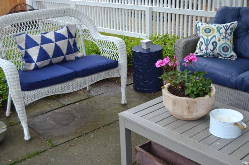 How to decorate a patio with mixed and matched eclectic furniture.