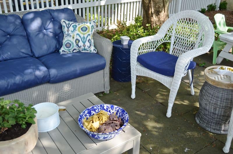 How to decorate a patio with mixed and matched eclectic furniture.