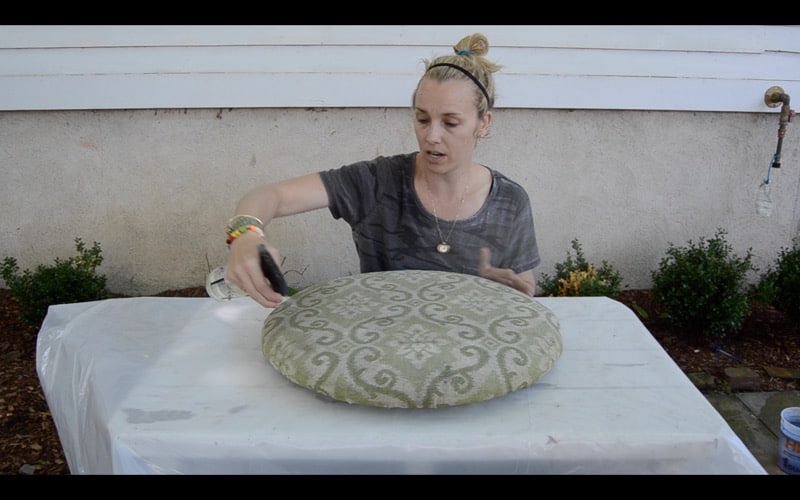 How to makeover patio cushions by painting them with regular ol’ latex paint.