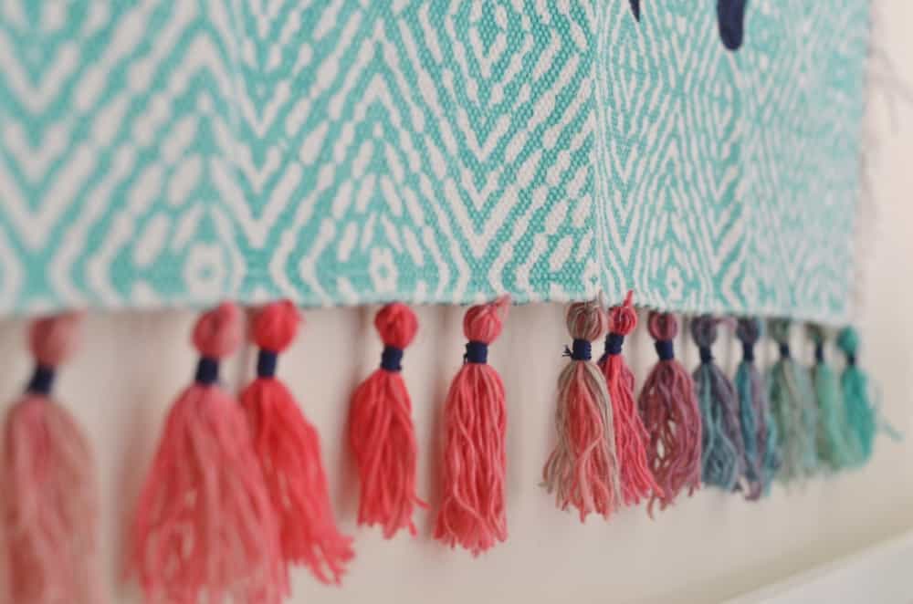 Turn a simple cotton throw rug into a fun custom wall tapestry.