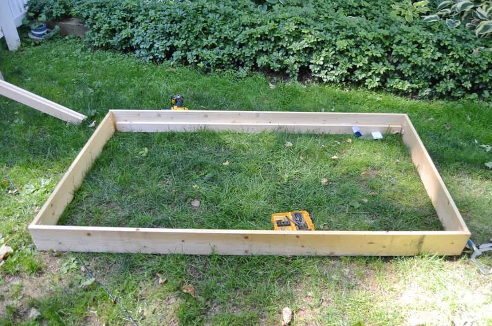 Simple DIY trundle bed to bring in extra sleeping in a kids room.