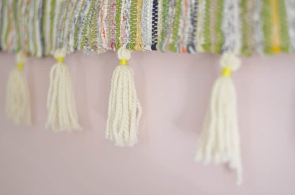 Turn a simple cotton throw rug into a fun custom wall tapestry.