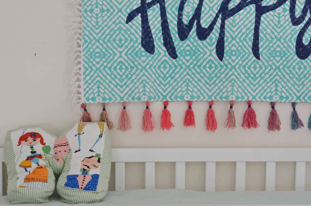 Turn a simple cotton throw rug into a fun custom wall tapestry.