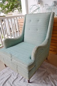 Preparing an old craigslist chair to be repholstered.
