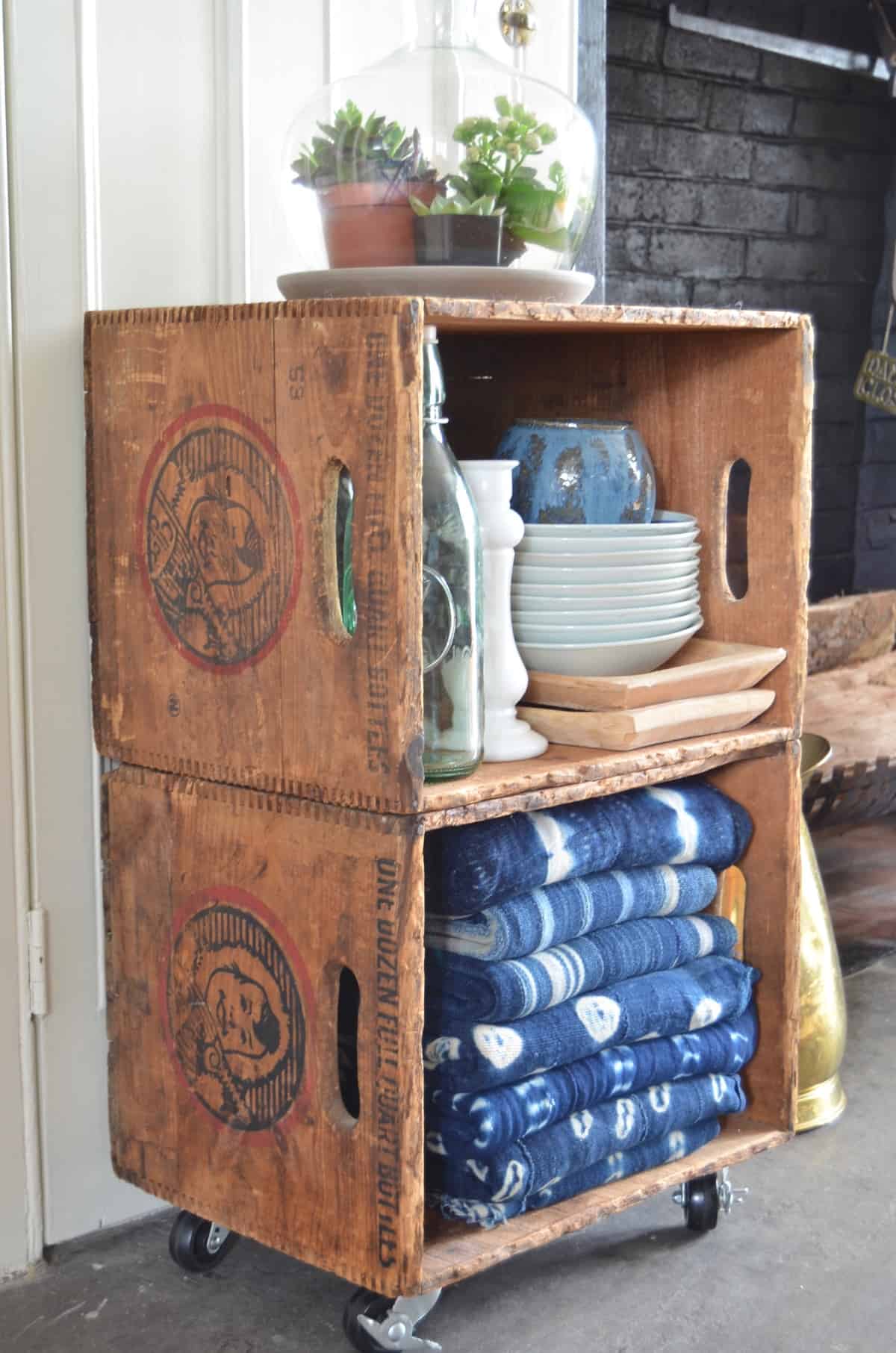 Thrifty storage from flea market crates on casters.