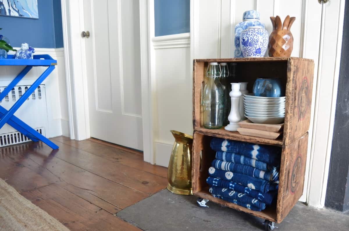 Thrifty storage from flea market crates on casters.