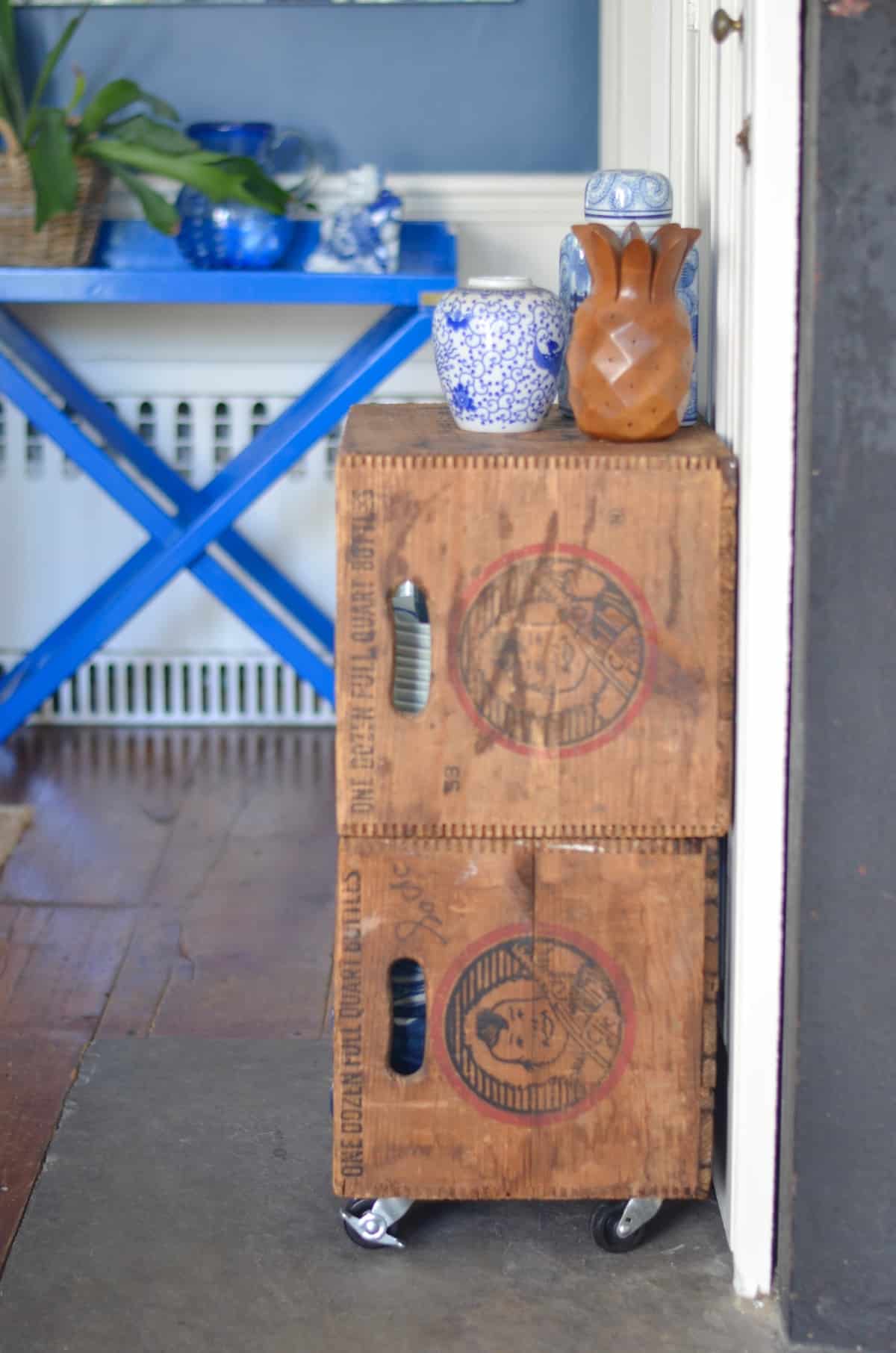 Thrifty storage from flea market crates on casters.