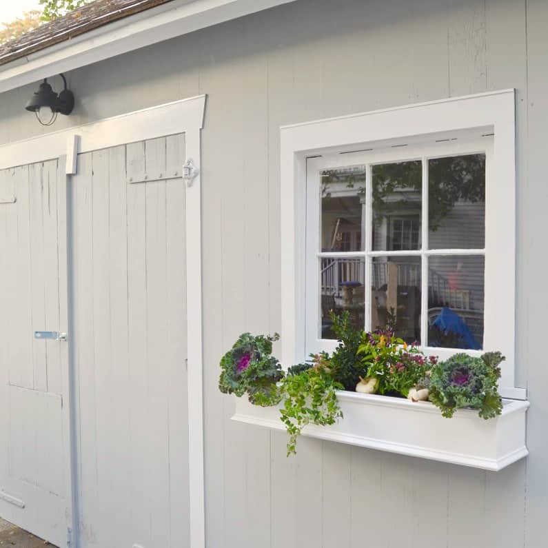 Backyard shed makeover- adding window boxes.