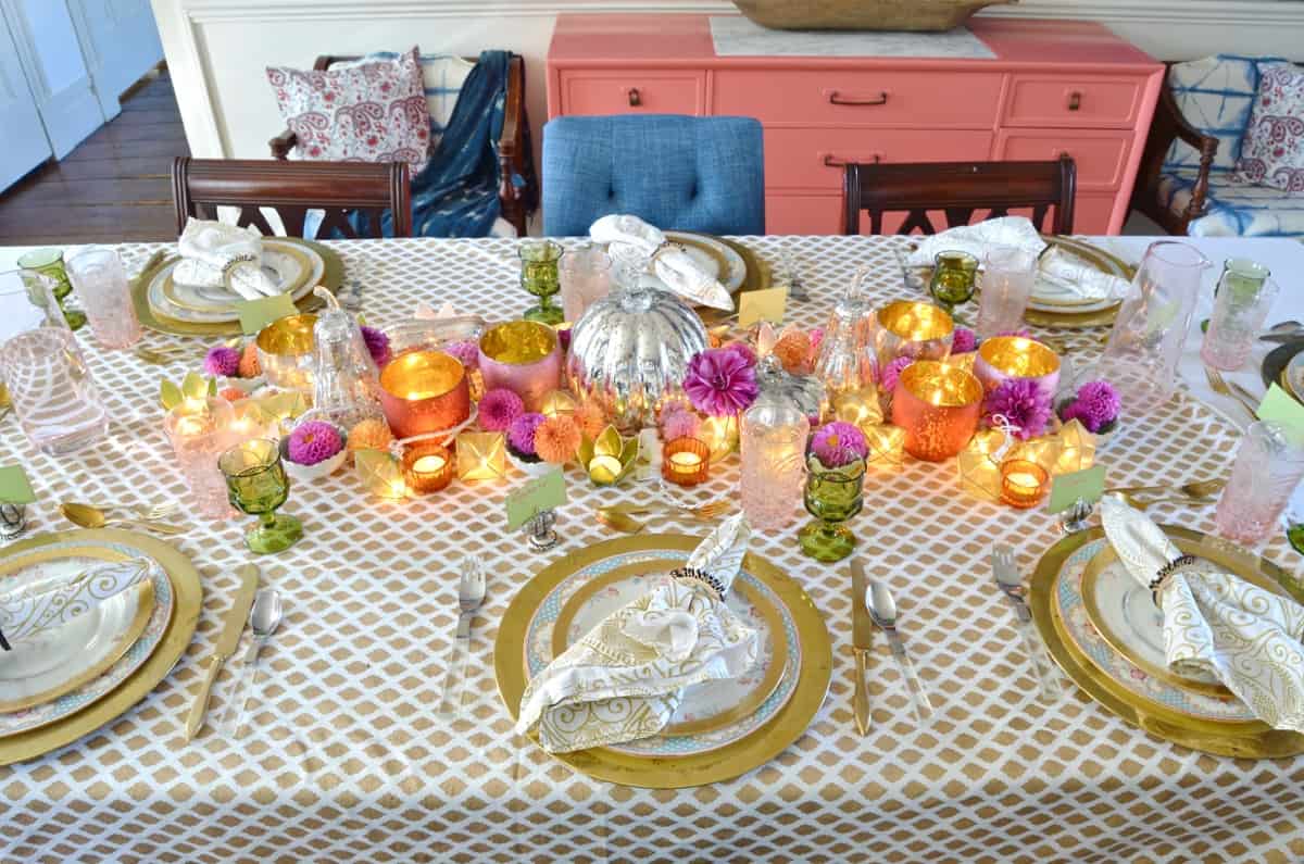 Pink and green and floral eclectic Thanksgiving tablescape.