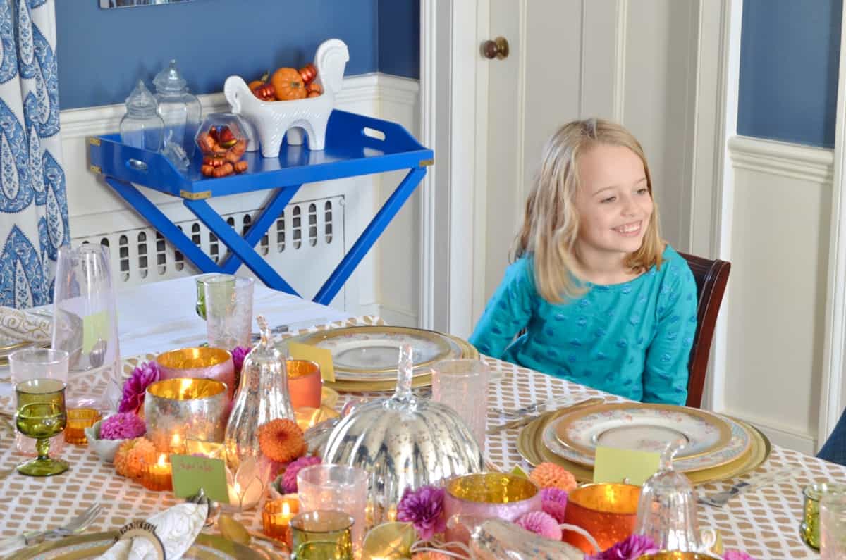 Pink and green and floral eclectic Thanksgiving tablescape.