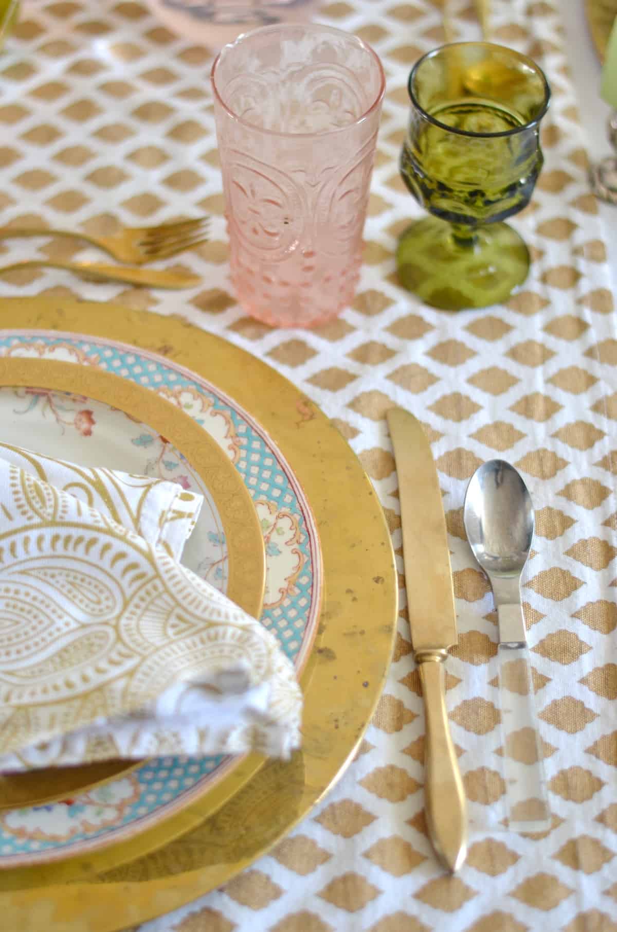 Pink and green and floral eclectic Thanksgiving tablescape.