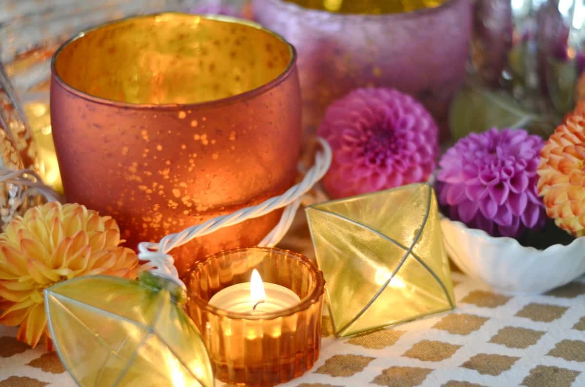 Pink and green and floral eclectic Thanksgiving tablescape.