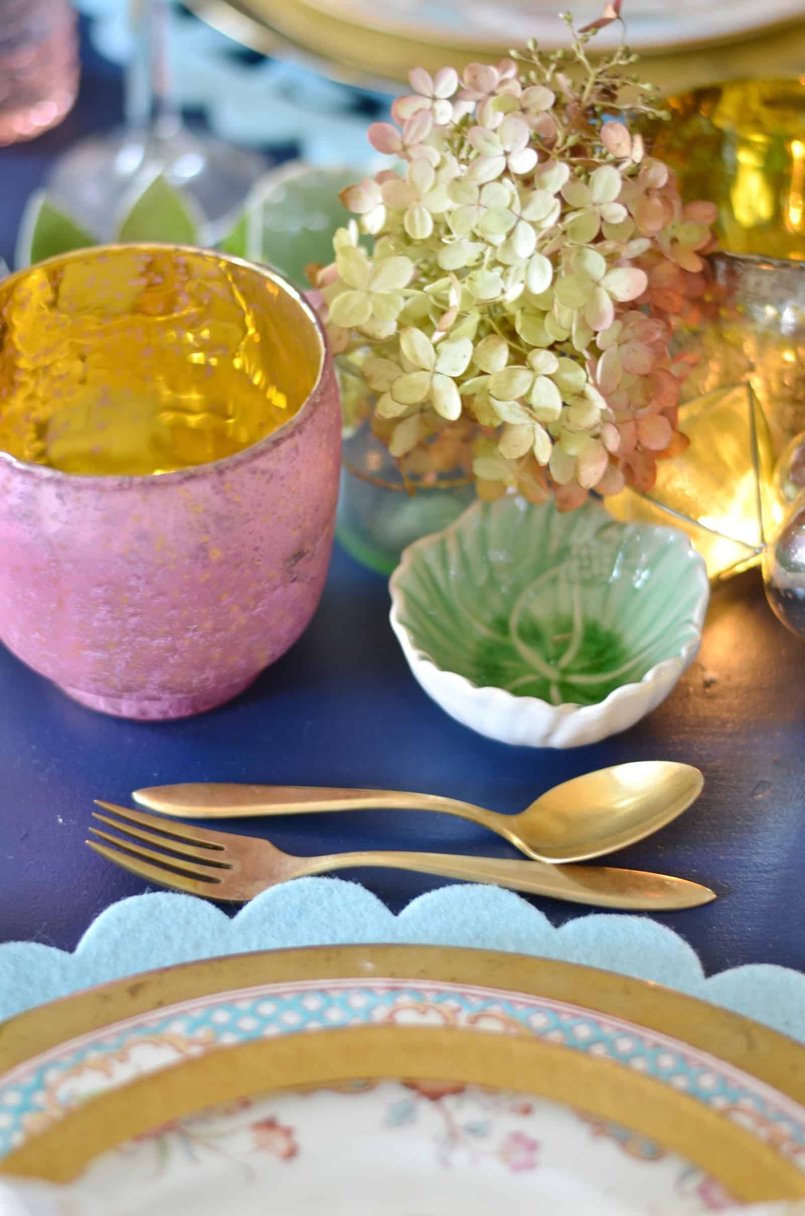 Pink and green and floral eclectic Thanksgiving tablescape.