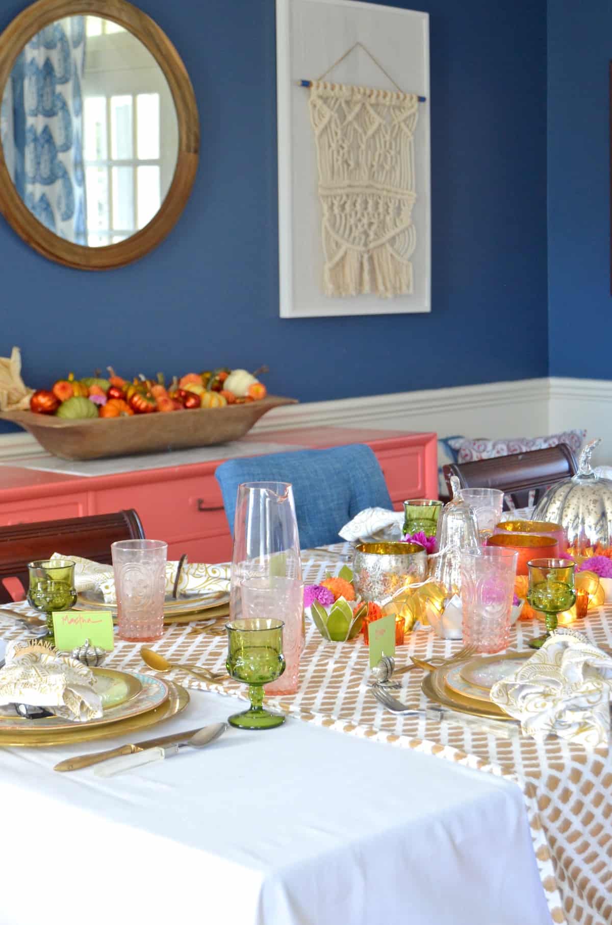 Pink and green and floral eclectic Thanksgiving tablescape.