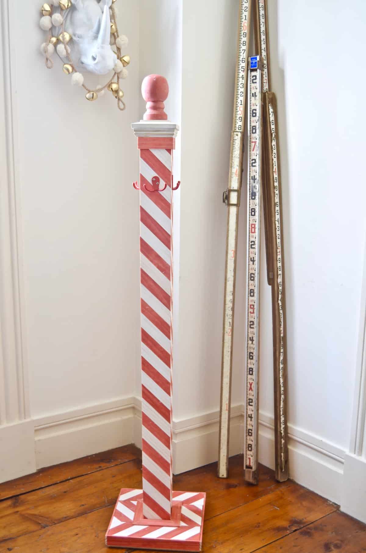 DIY striped lattice holiday stocking post- adorable way to display your stockings this season!