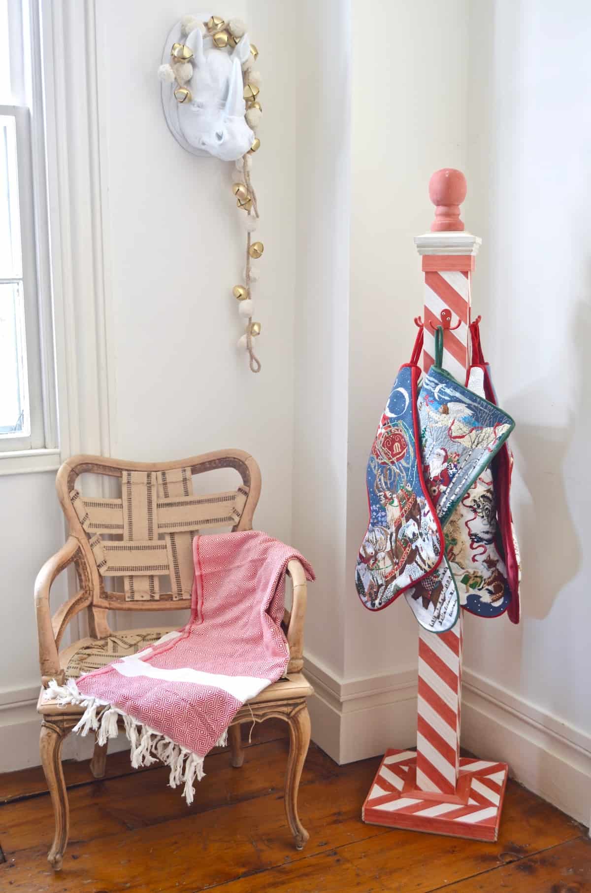 DIY striped lattice holiday stocking post- adorable way to display your stockings this season!