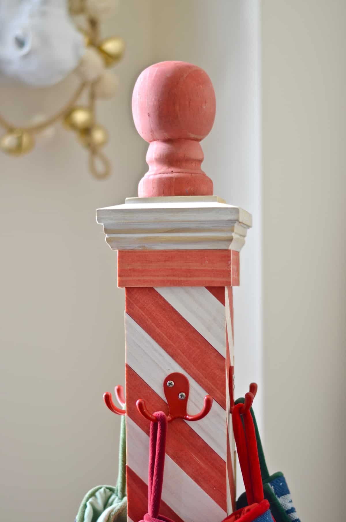 DIY striped lattice holiday stocking post- adorable way to display your stockings this season!