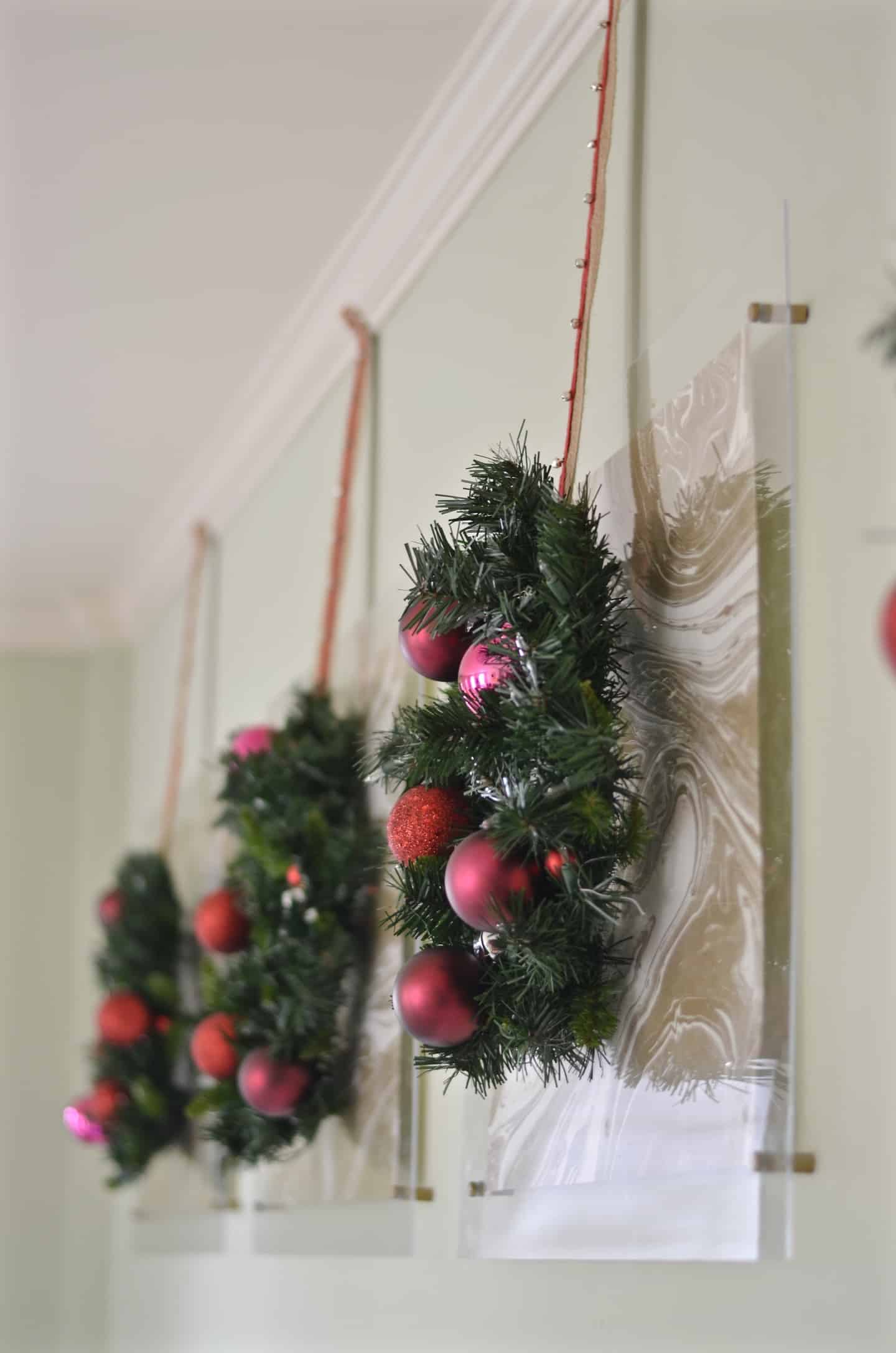 Festive holiday master bedroom in classic green and red.