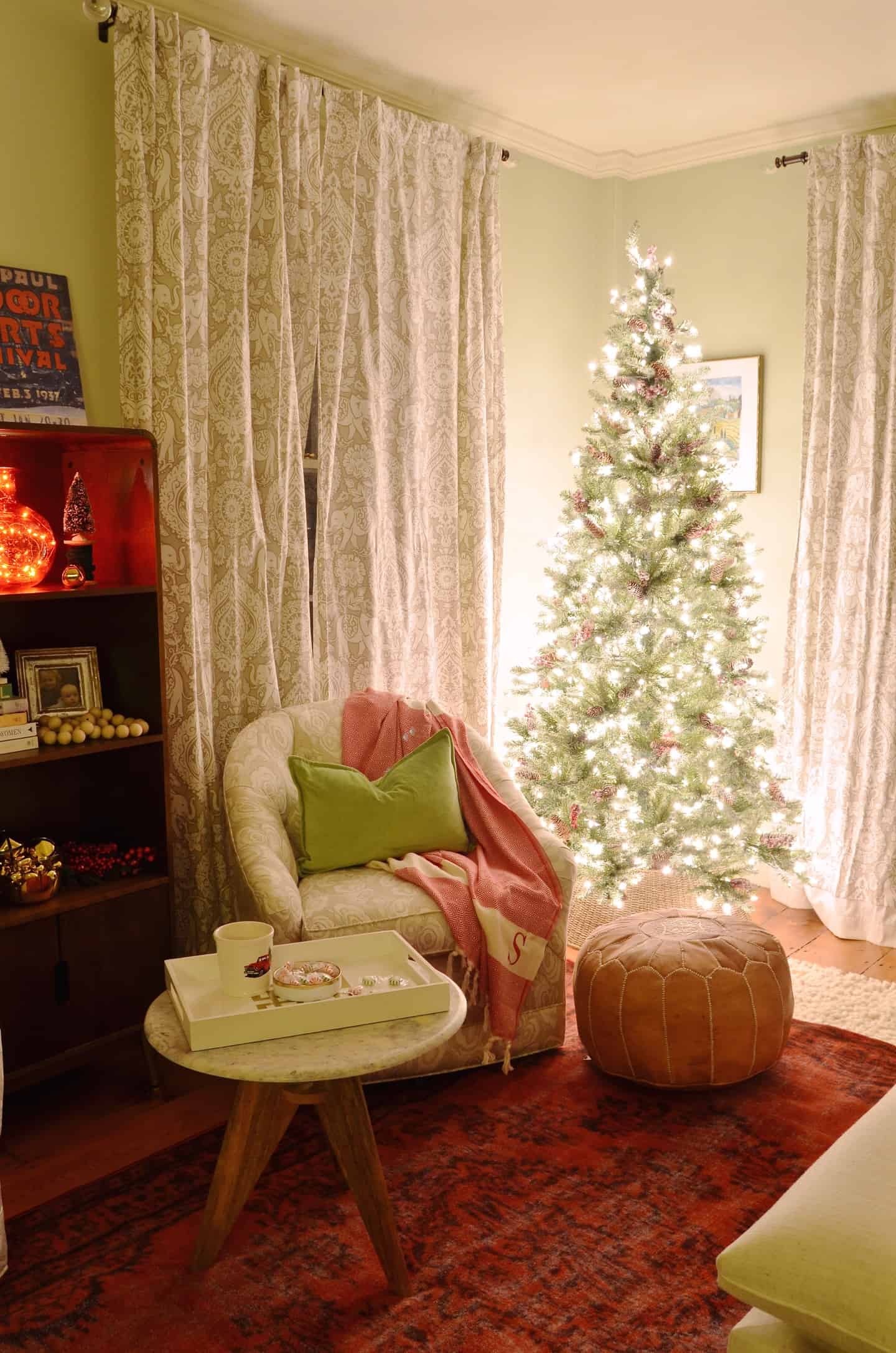 Festive holiday master bedroom in classic green and red.