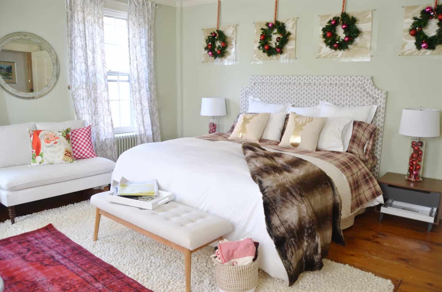 Festive holiday master bedroom in classic green and red.