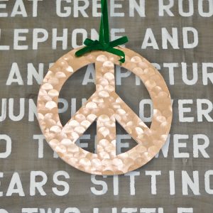 DIY bloggers transform basic craft store peace signs into Peace Love and DIY creativity.