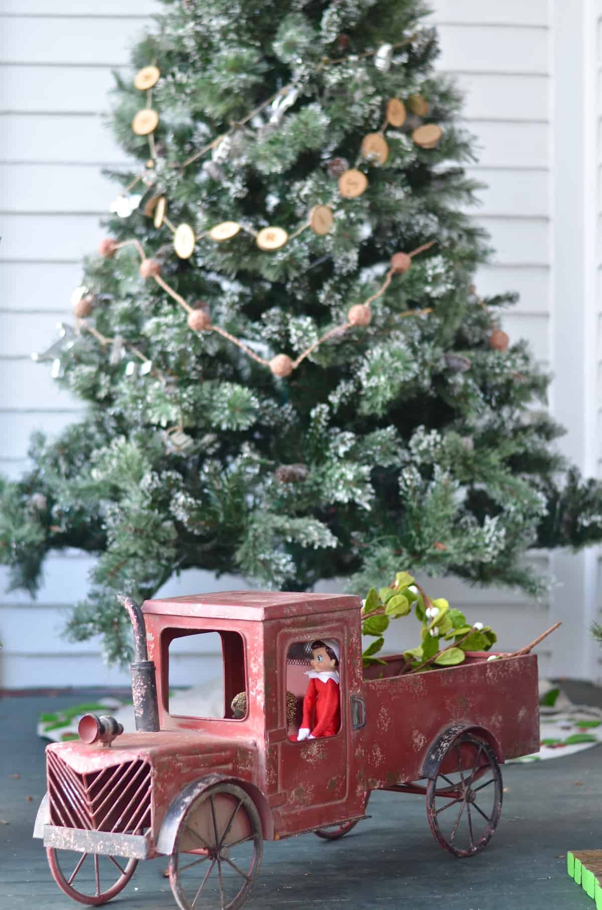 New England holiday house tour with lots of Christmas trees and classic red accents.