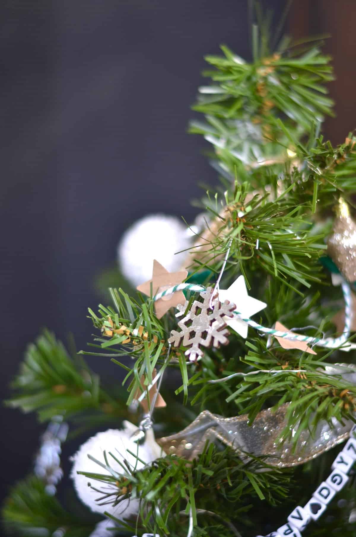 Decorating a tree with DIY mini garlands galore.