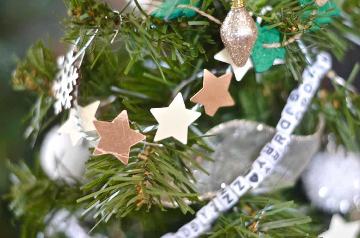 Decorating a tree with DIY mini garlands galore.